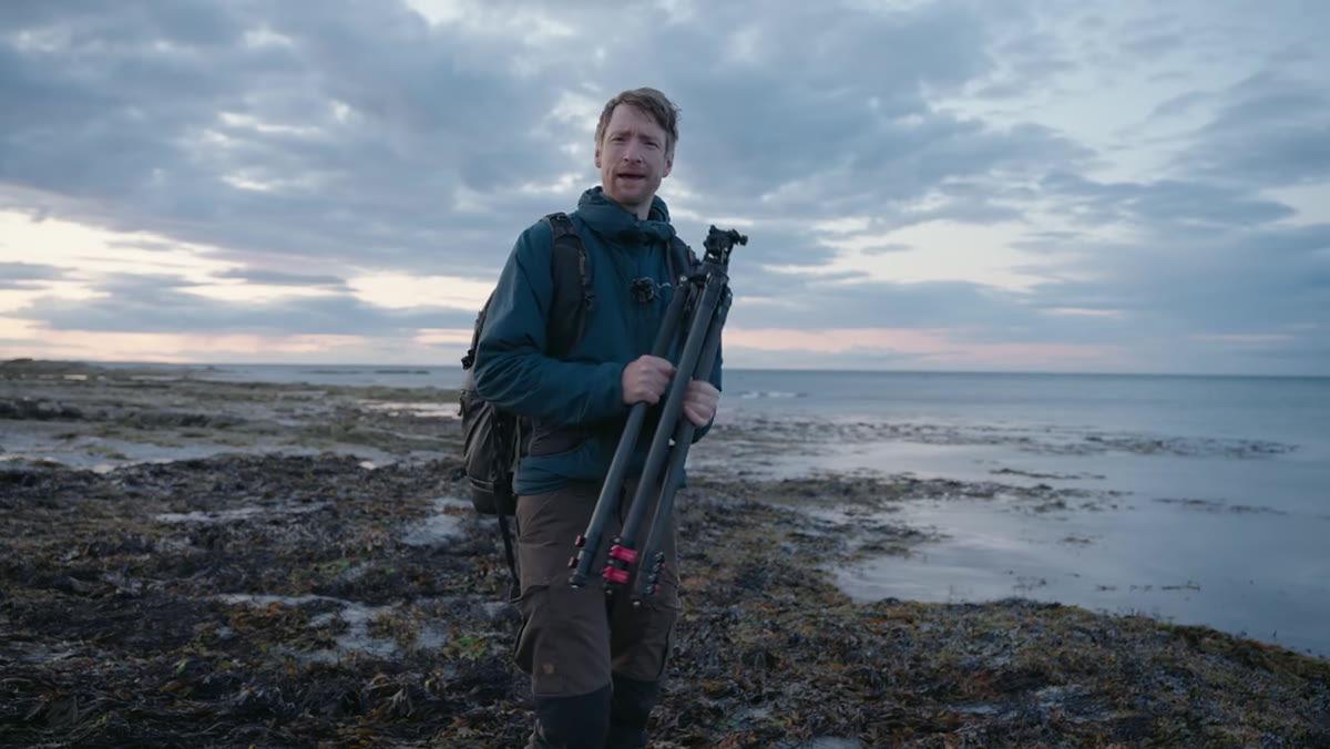 Photographer back out shooting at second coastal location after sunset