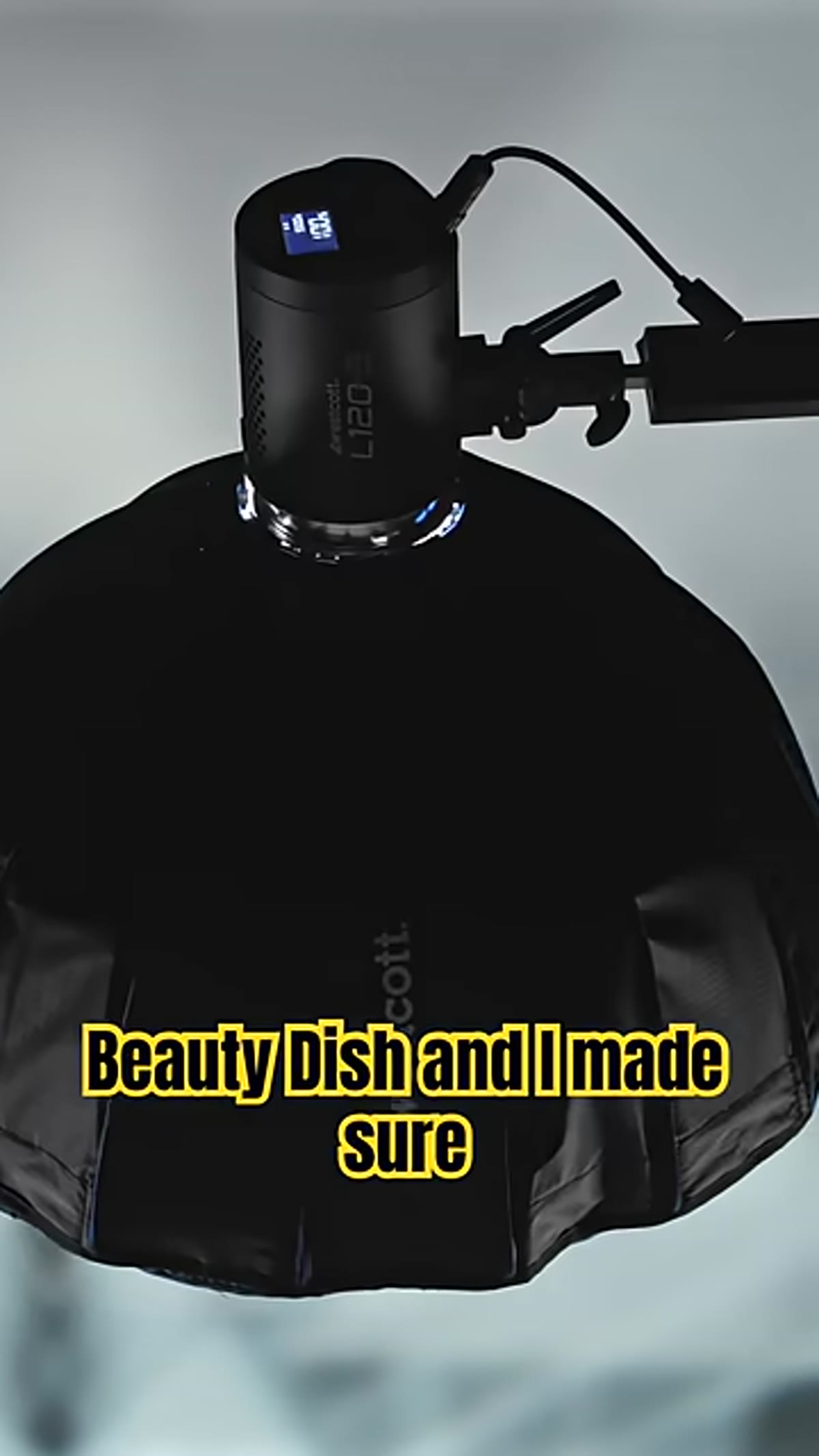 A beauty dish mounted on a strobe aimed at the subject position