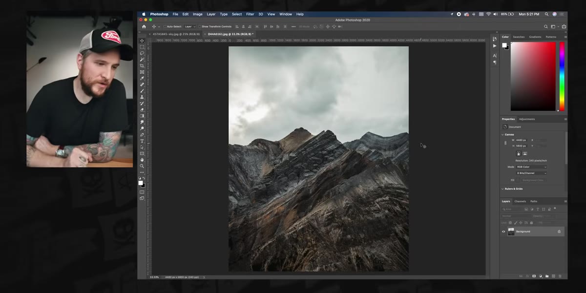 Photoshop open with mountain photo on canvas