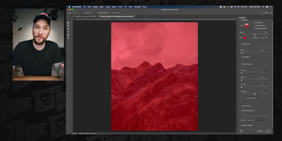 Brush painting over mountain peaks to preserve foreground
