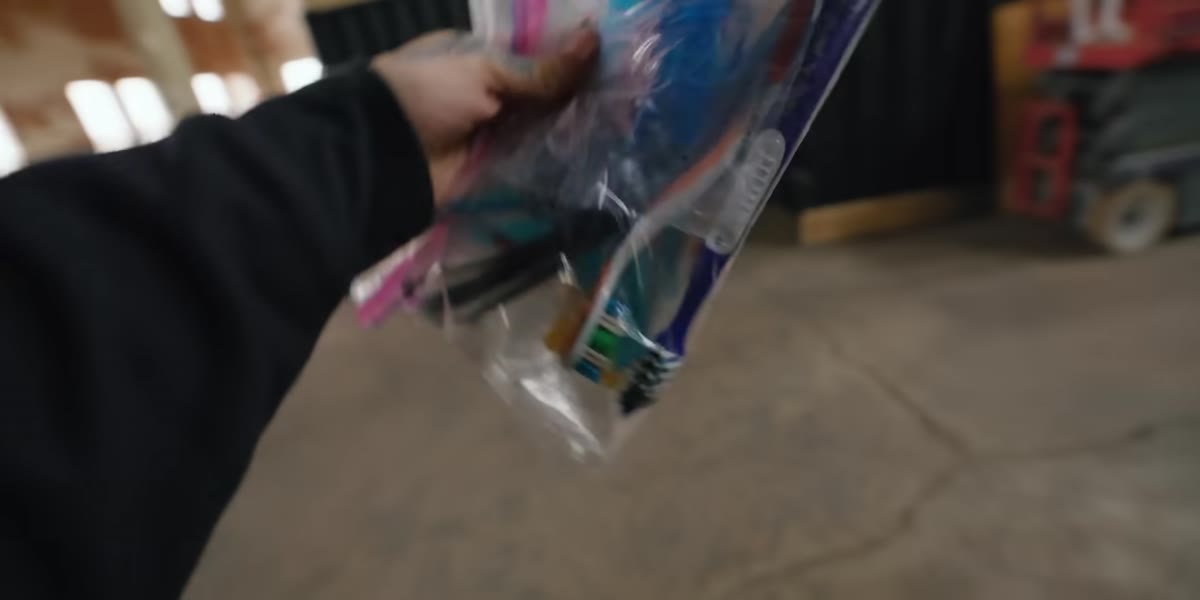 Kristoff&rsquo;s kit bag with zip ties and a toothbrush for post-crash cleaning