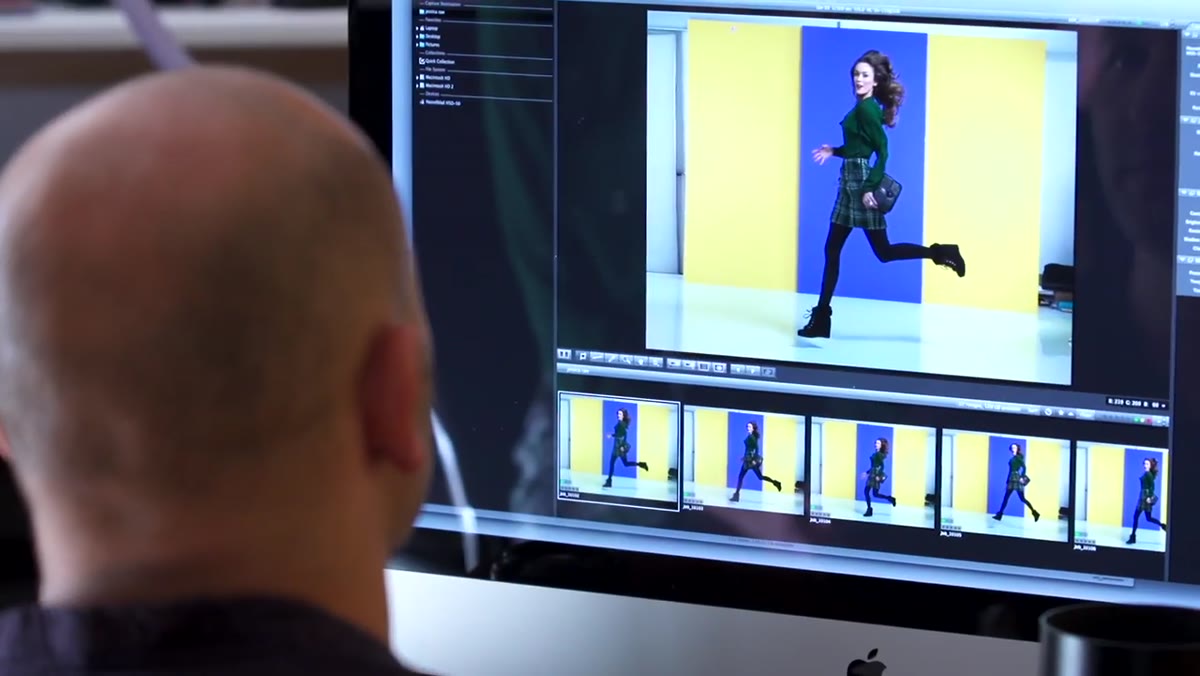 Photographer responding enthusiastically after reviewing a strong frame