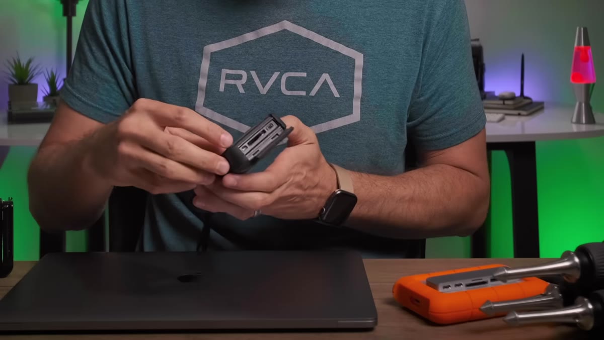 Port panel open showing SD slot, USB-C, and micro HDMI