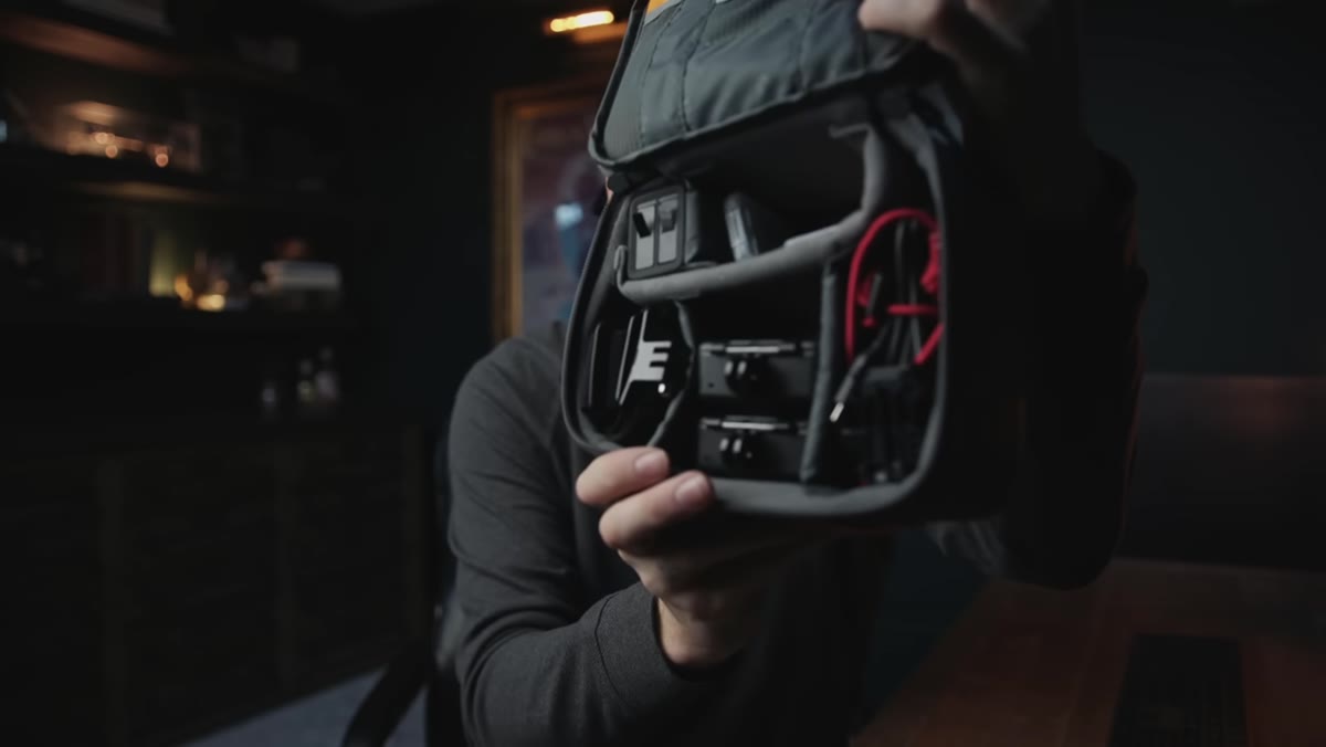 GoPro, mounts, and action camera accessories laid out on the floor