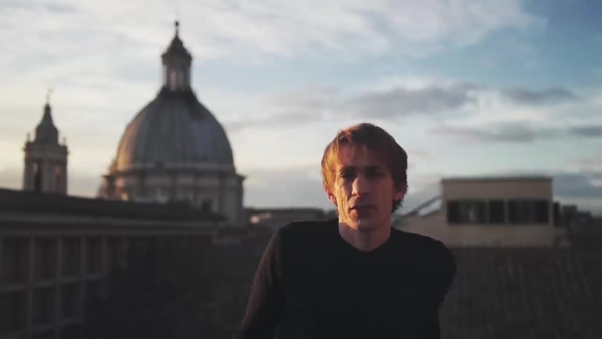 Tucker walking through Rome streets with the X-T20