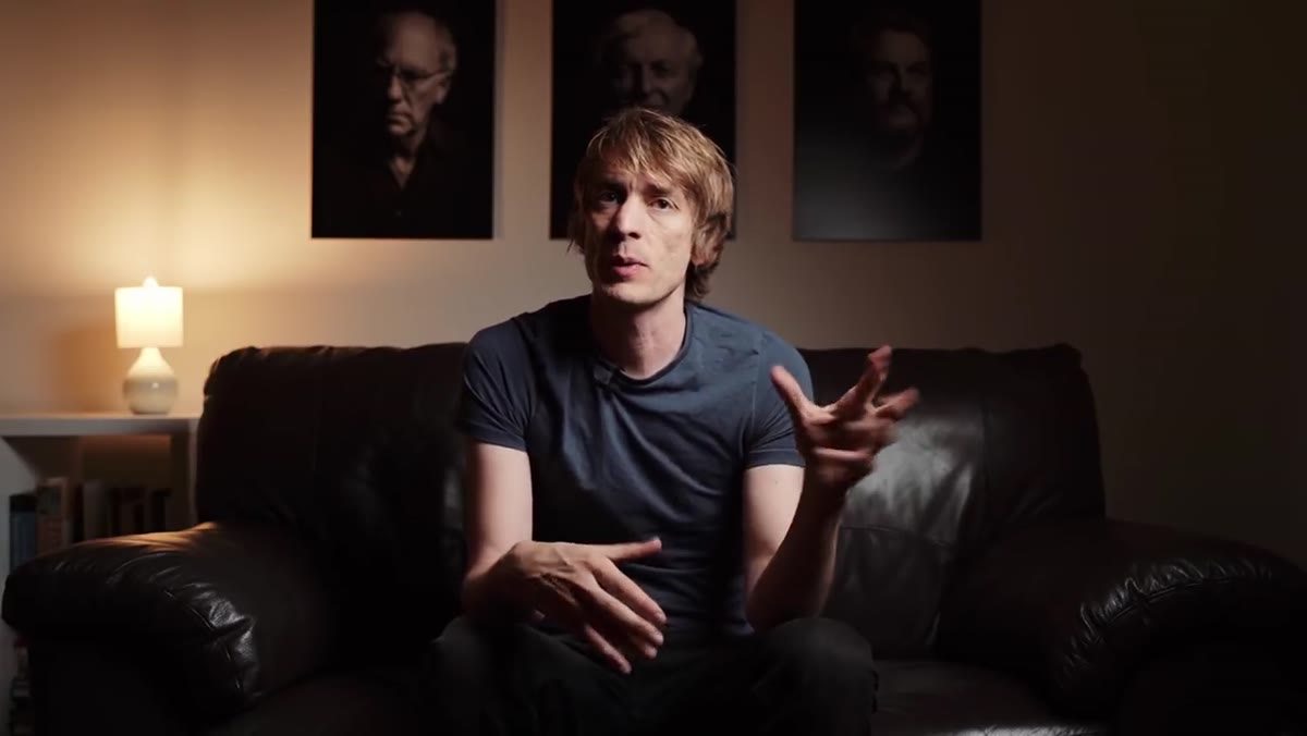 Sean Tucker speaking directly to camera about fear of approaching strangers