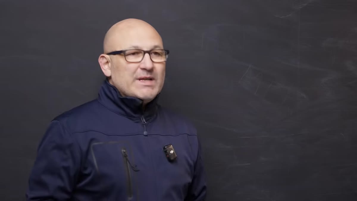 Presenter listing the first camera selection factors
