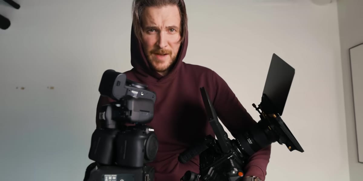 All camera bodies laid out together on a surface