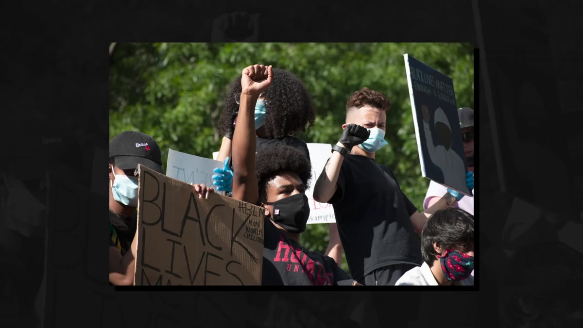 Raw submitted protest photo displayed before any editing begins