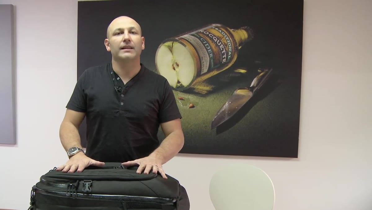 Taylor explaining why he keeps camera gear in carry-on rather than checked baggage