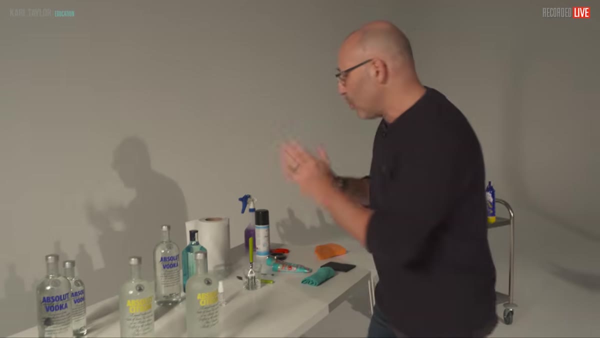 Bottle with real water spray running and smearing