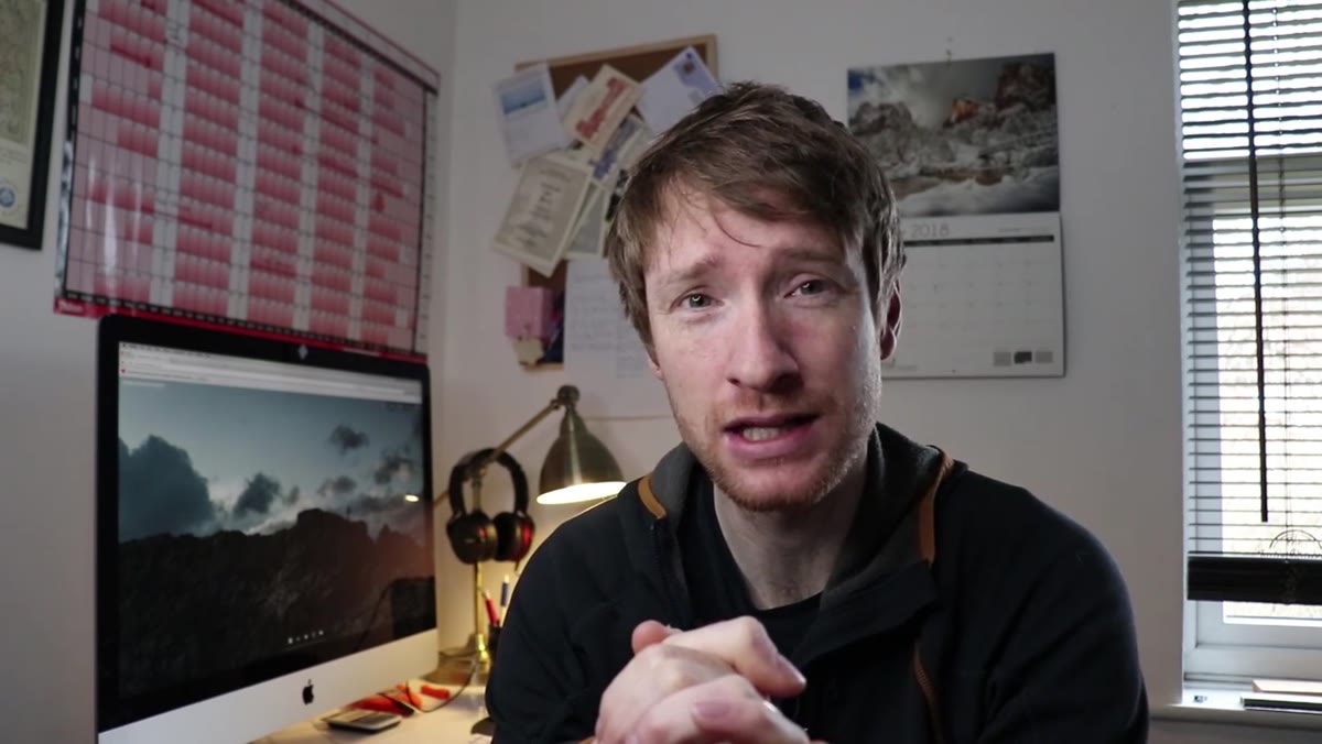 caption: Heaton explaining his decision to show five images