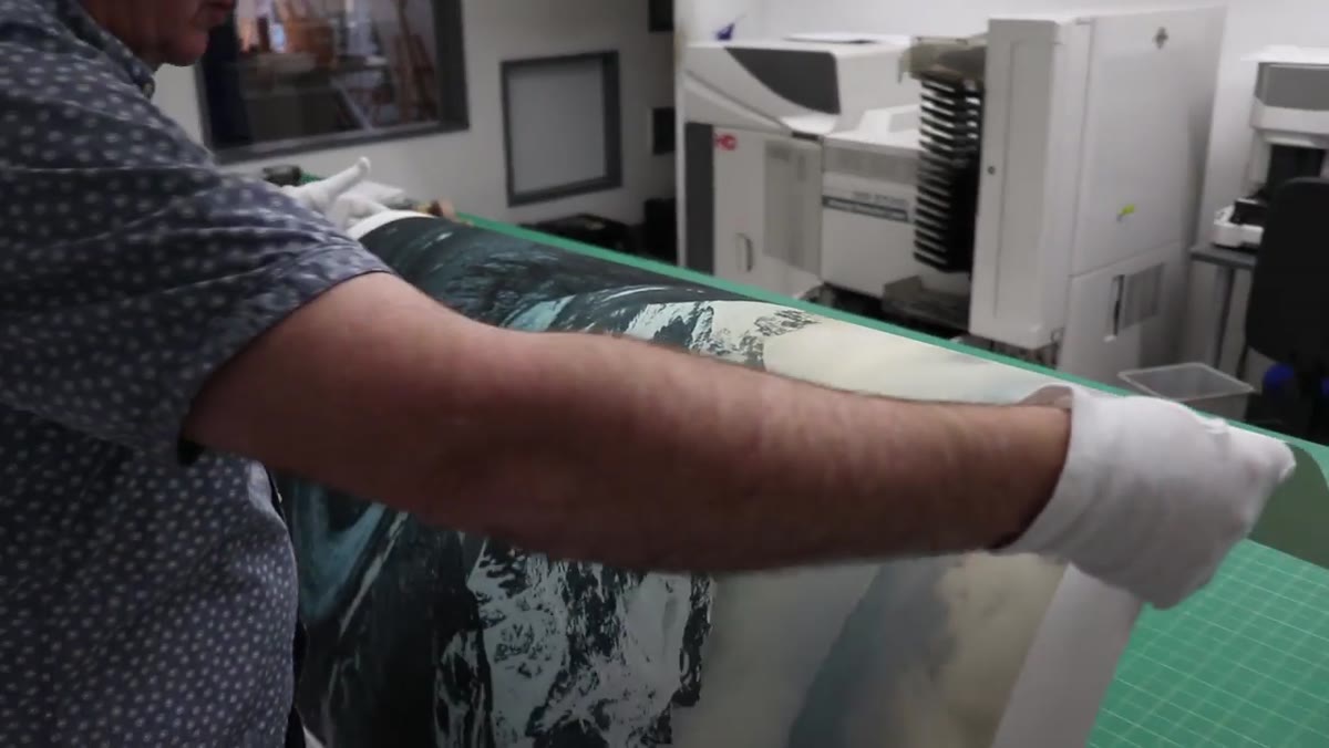 caption: Heaton selecting Hahnemühle German Etching paper for all prints
