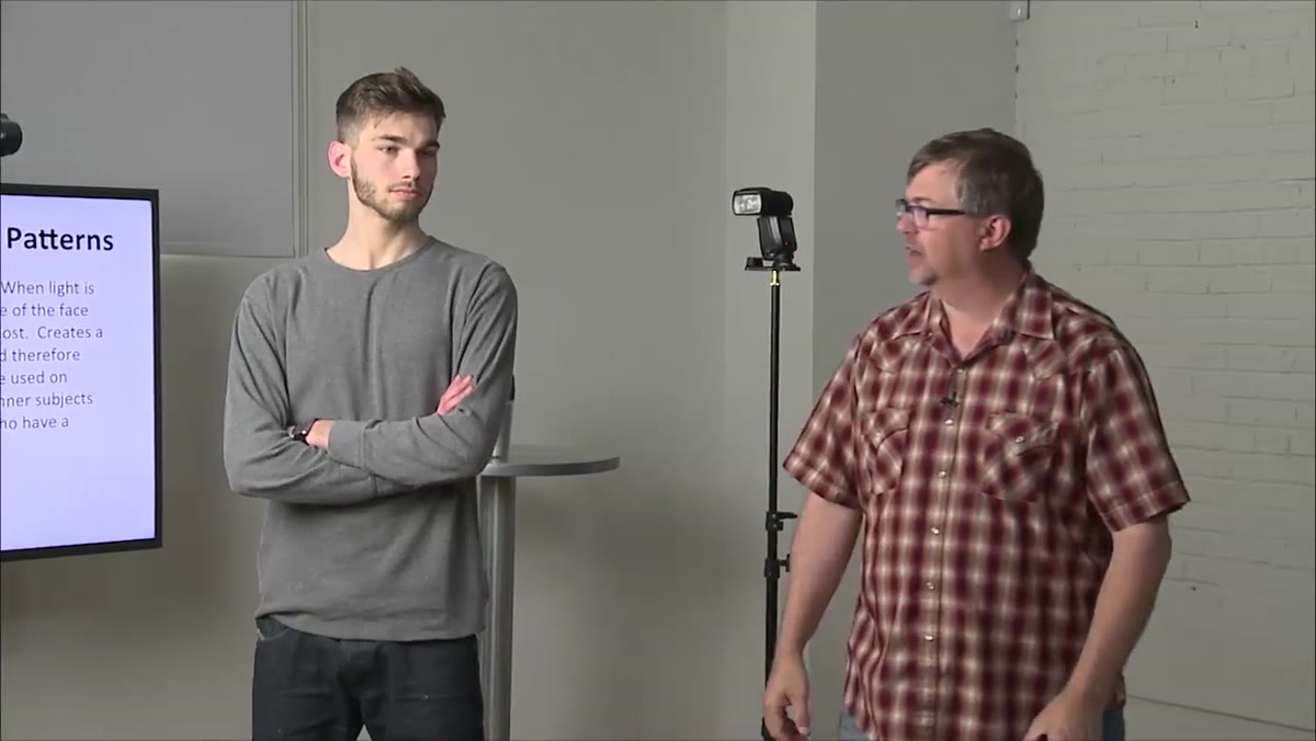 Subject crossing arms naturally in front of body