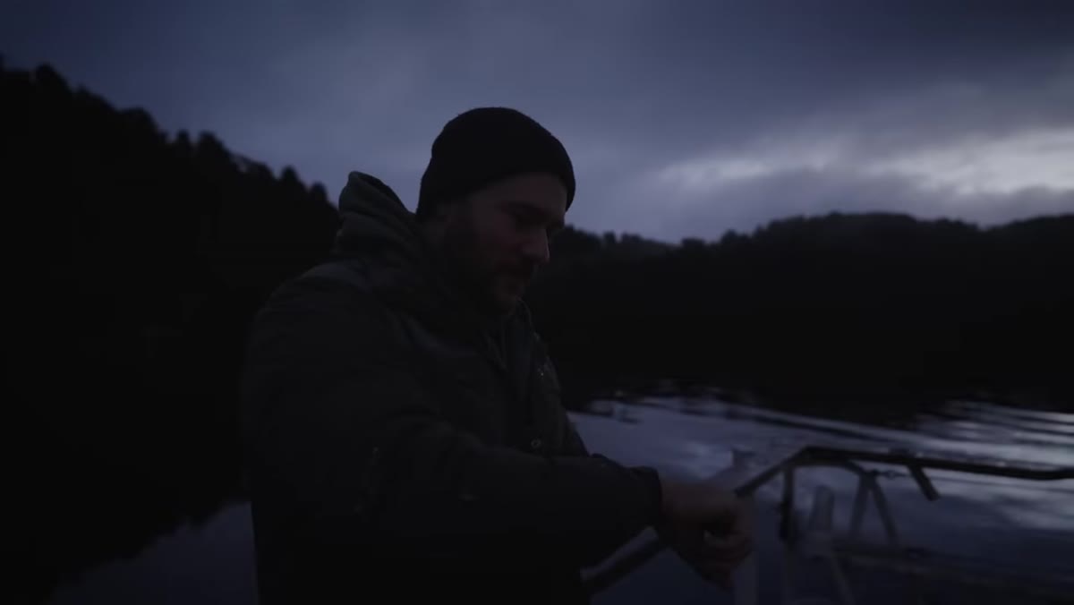 Early morning on the water before sunrise, low light conditions