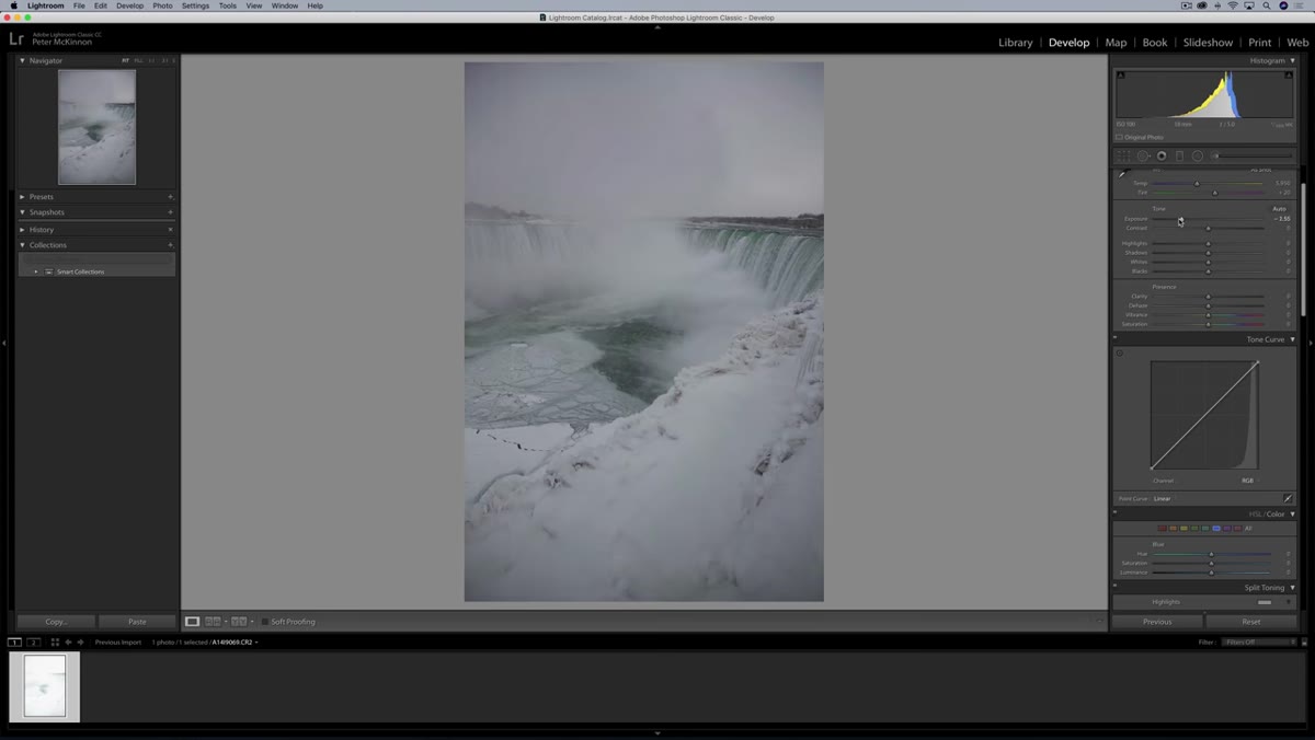 Dragging the exposure slider down to reveal hidden detail in the shot
