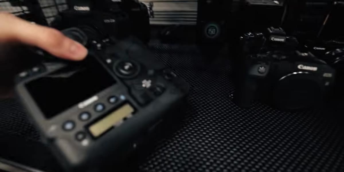 CFexpress card being loaded into the 1DX Mark III body