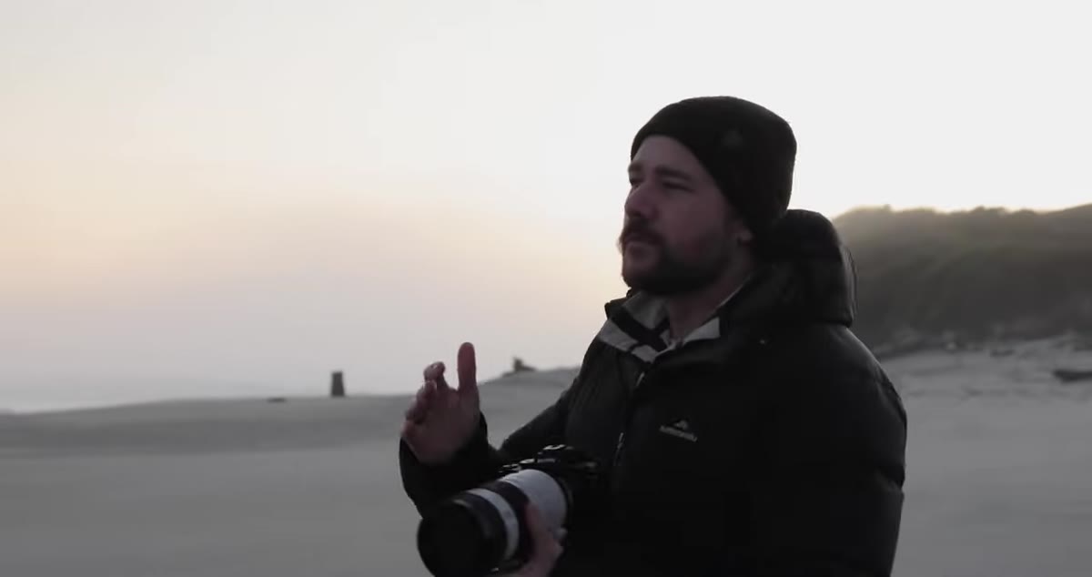 Photographer beginning lateral hip movement before firing shutter