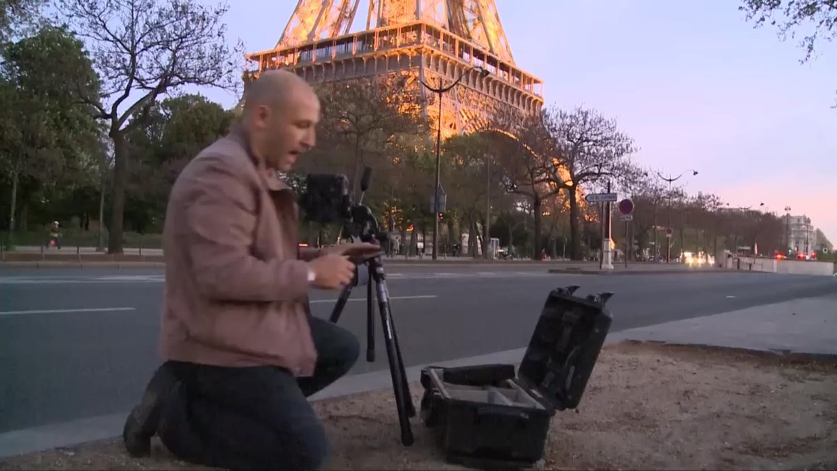 City scene with slow shutter speed capturing car light trails