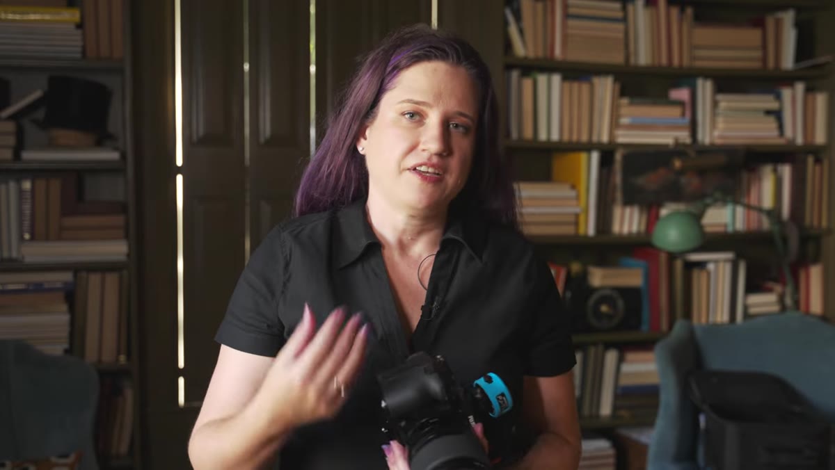 Photographer reviewing test shots and adjusting power ratios