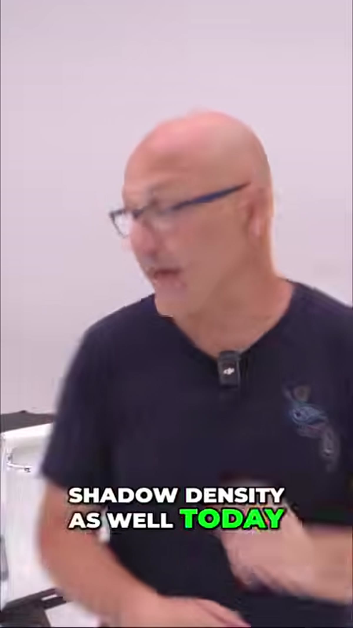 Instructor explaining shadow density versus sharpness concepts