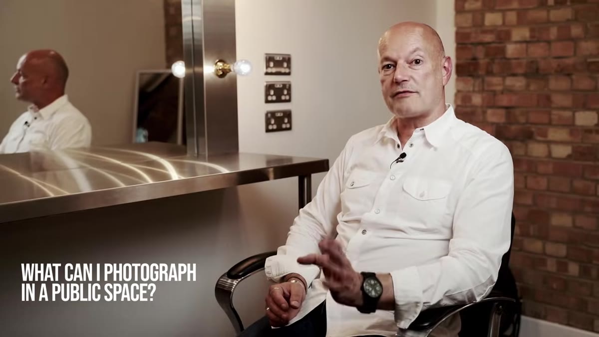 Nick explaining the public place rule to camera