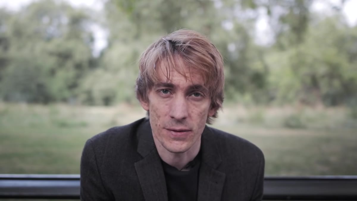 Sean Tucker speaking directly to camera, calm and direct