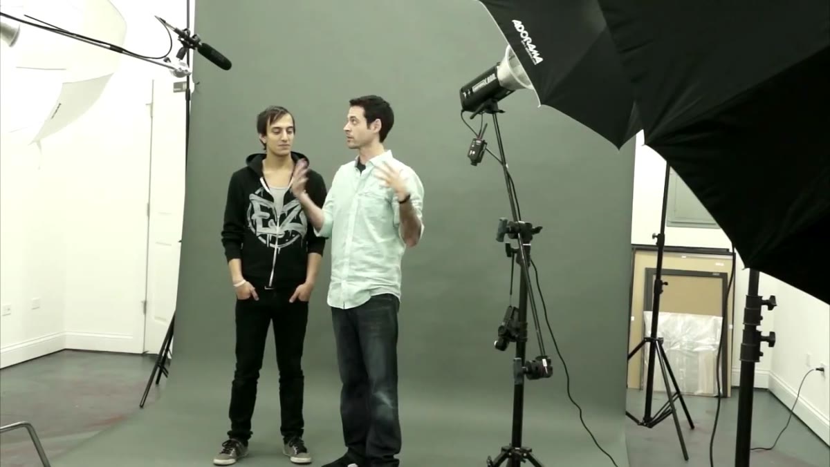 7-inch silver reflector attached to strobe head, aimed at subject