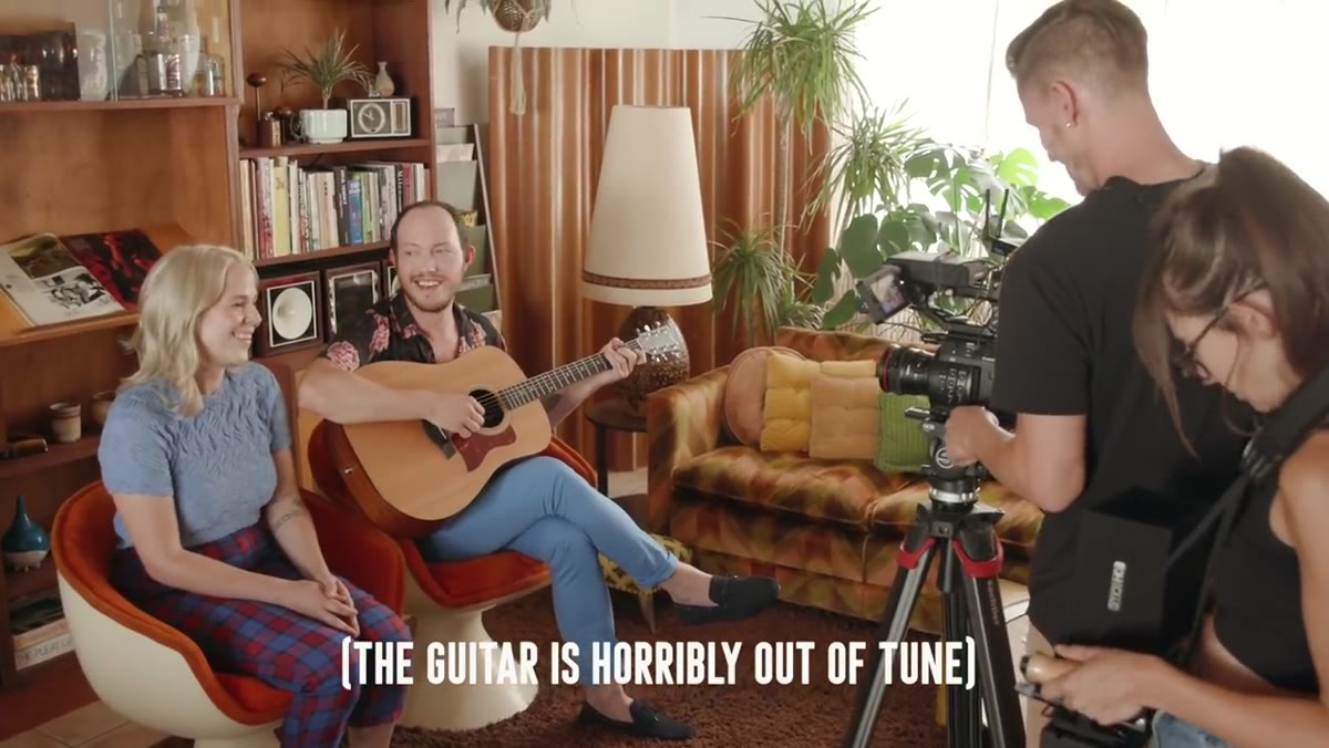 Laughter breaking out mid-take on set between performer and crew