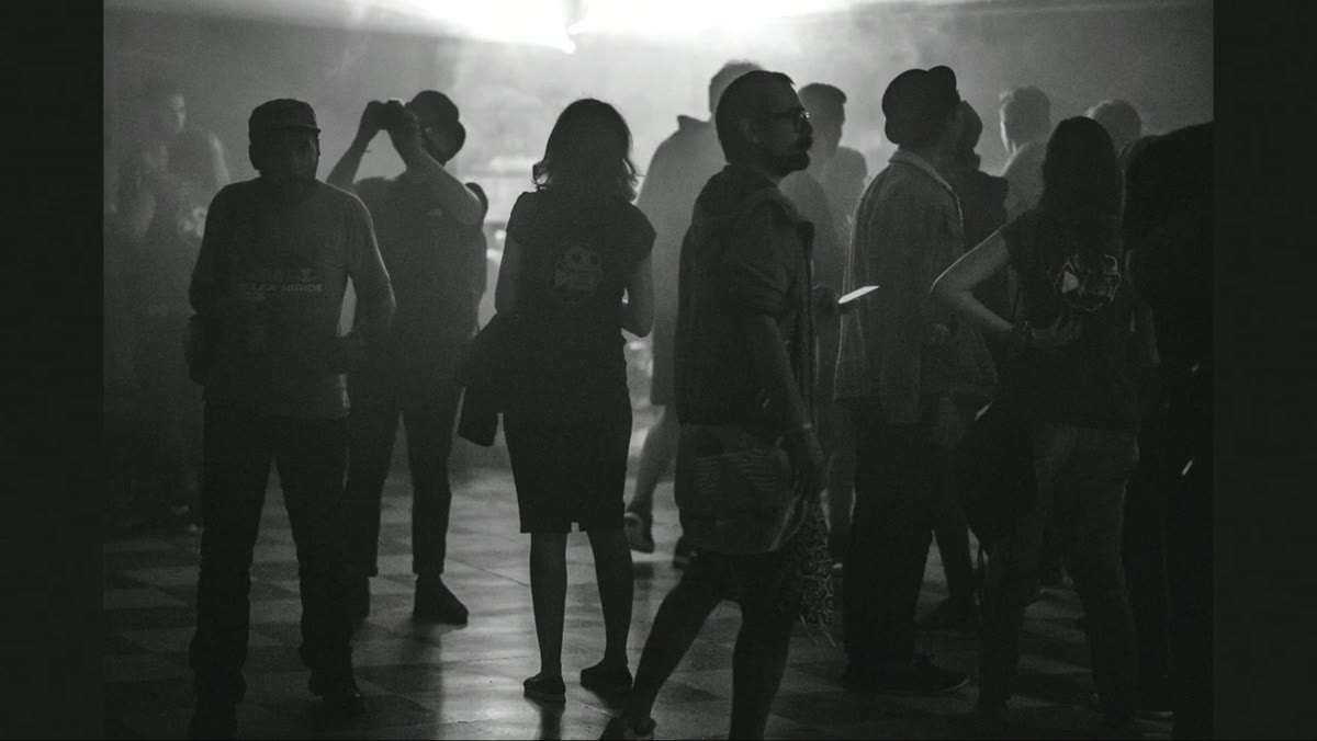 Three misty, low-contrast black-and-white cinematic images on screen