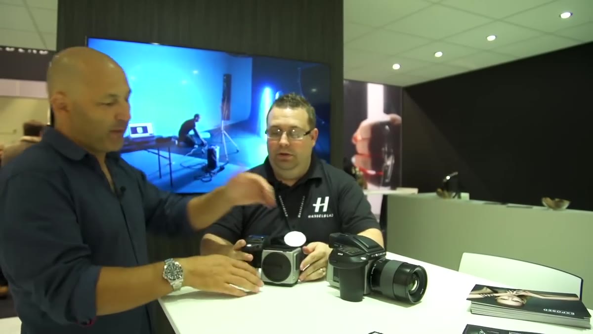 Carl and Mark examining the Hasselblad H5X body without lens or back attached