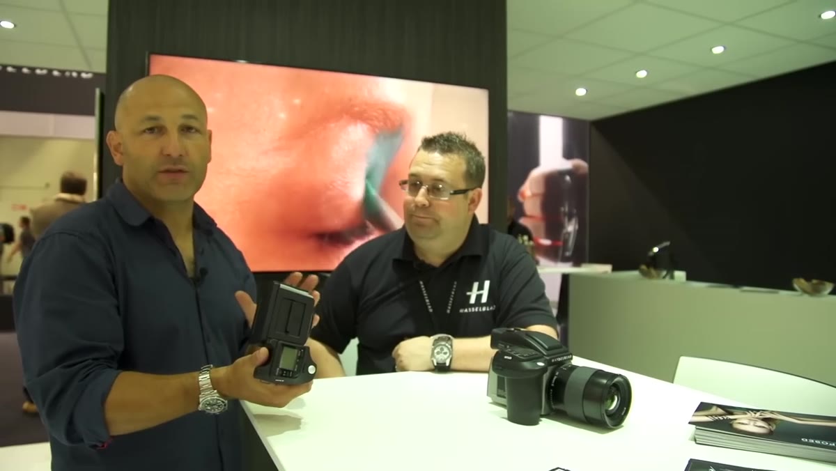 Carl gesturing toward the H5X while discussing back compatibility