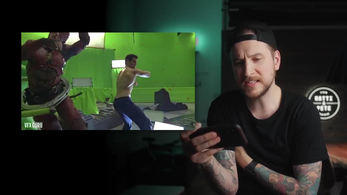 Green screen performers moving in choreographed fight sequence