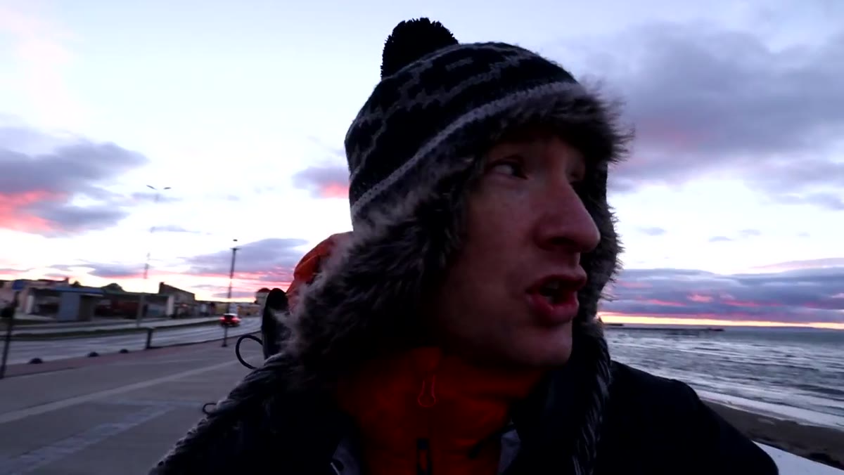 Heaton waiting as sunrise light hits the dilapidated pier