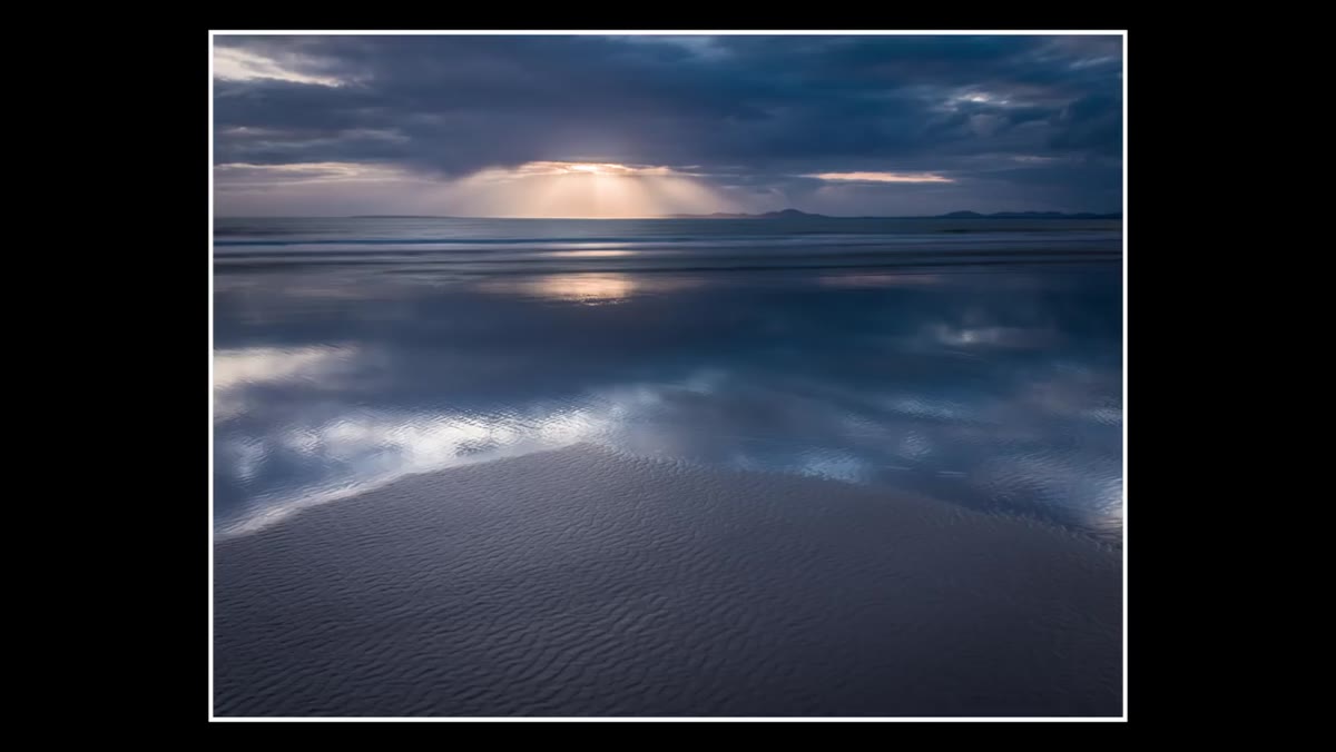 Heaton displaying a recent landscape photograph taken two days prior