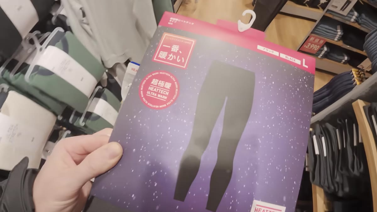 Thomas in Tokyo store buying socks and clothing essentials
