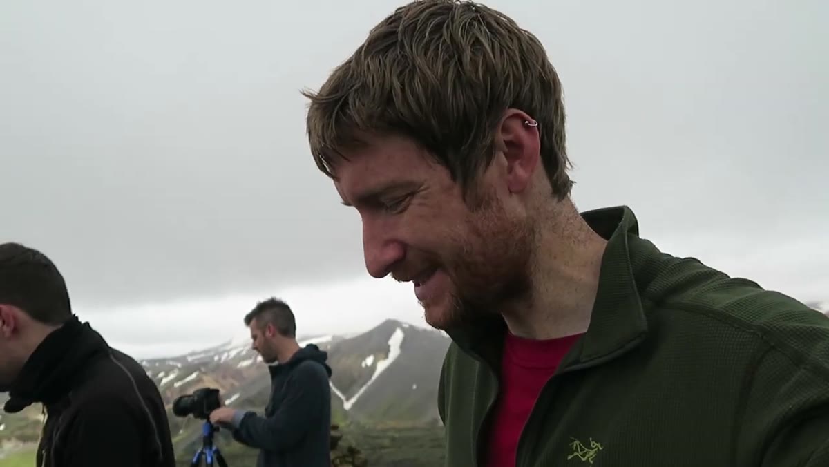 Wide panoramic view from the summit, cameras set up along the ridge