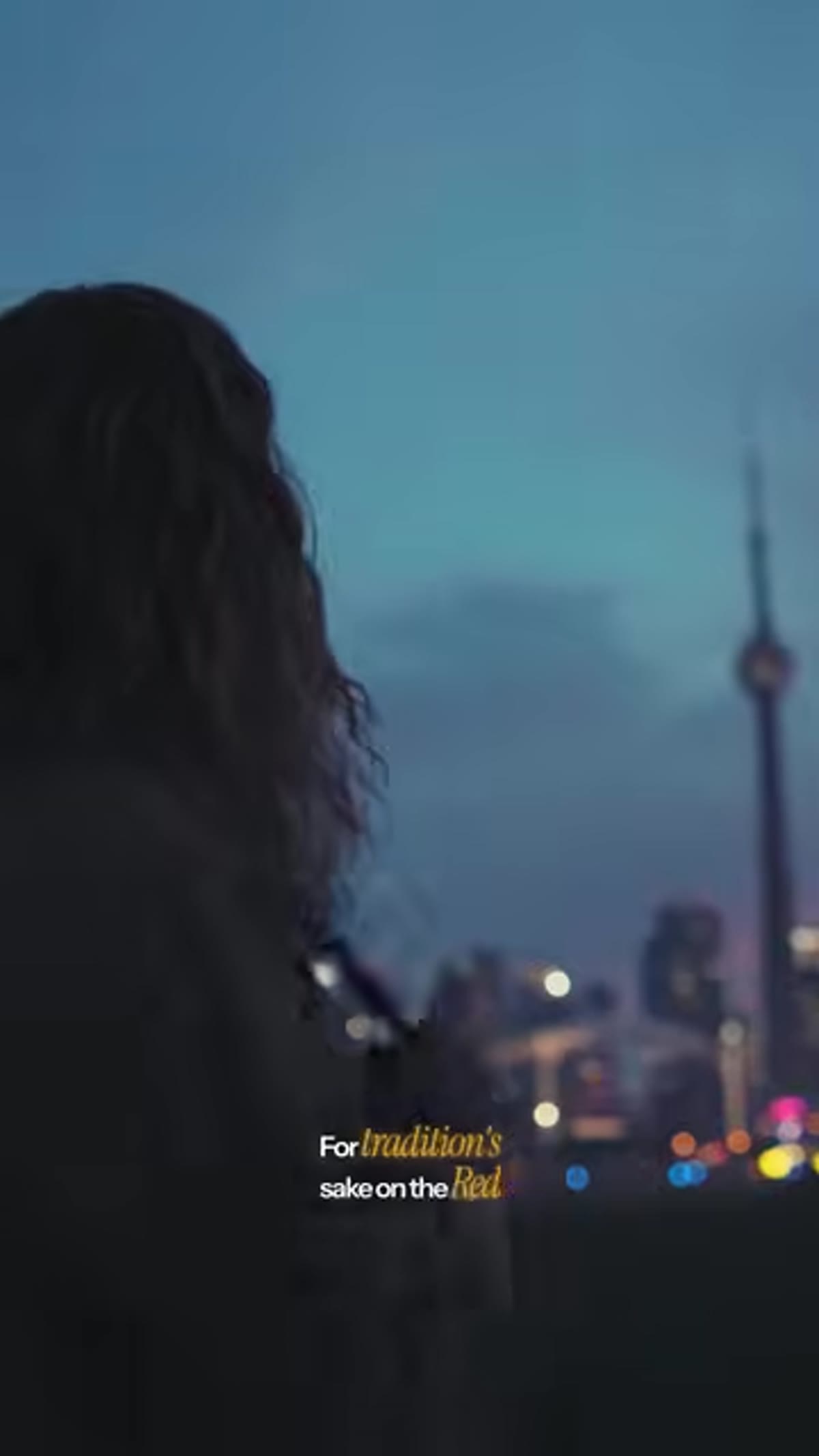 Peter McKinnon holding a film camera on location