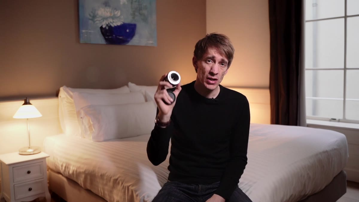 Tucker attaches 35mm lens to Sony body, discusses street shooting profile