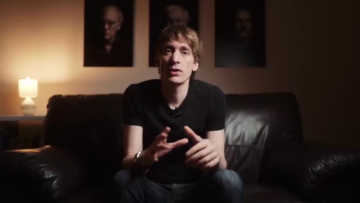 Sean Tucker speaking directly to camera about photography and storytelling