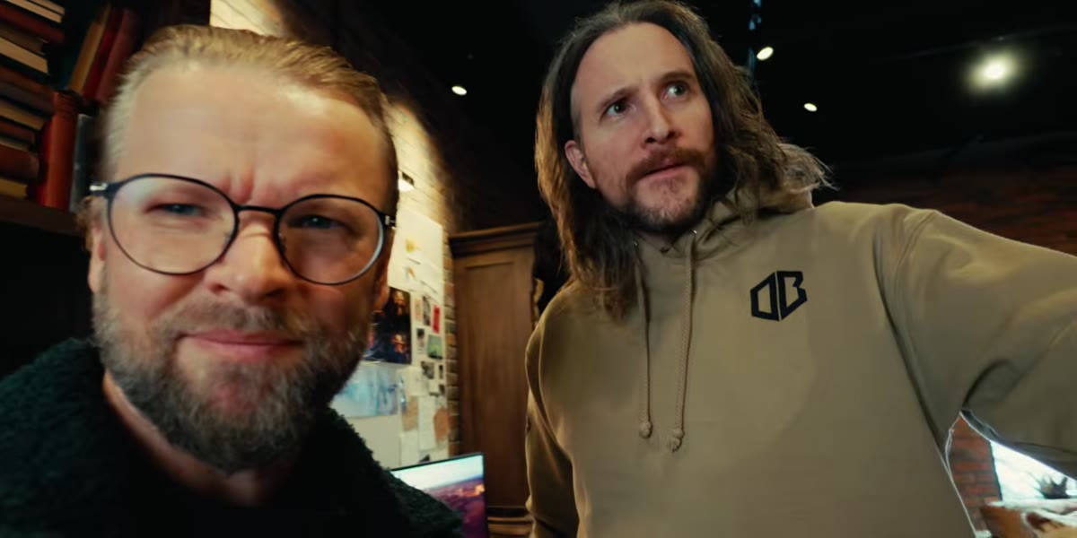 Both hosts comparing image quality side by side on cameras